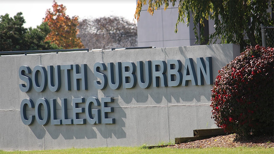 Main Campus Exterior Sign in Fall