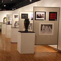 A photo taken in the Dorothea Thiel Gallery featuring art on display from a past Regional High School Student Art Exhibition